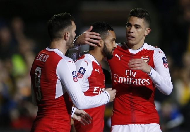 Lucas Perez, Theo Walcott and Gabriel celebrate a goal against Sutton, February 20, 2017 Lucas Perez, Theo Walcott, Gabriel, Arsenal, FA Cup, Sutton United, 5th round