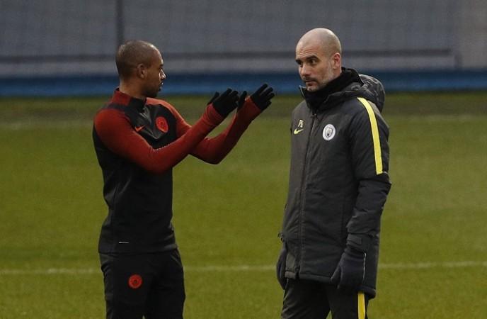 Manchester City midfielder Fernandinho and manager Pep Guardiola have a discussion during a training session, February 20, 2017 Fernandinho, Pep Guardiola, Manchester City, Monaco, Champions League