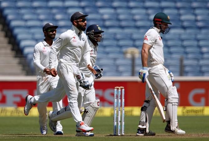 India captain Virat Kohli celebrates after taking the catch to dismiss Australia left-hander Shaun Marsh in the first Test, February 23, 2017 Virat Kohli, India, Shaun Marsh, Australia, 1st Test