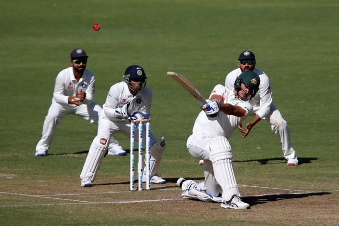 Mitchell Starc whacks the ball for a six during his unbeaten half-century on day one of the first Test match, February 23, 2017 Mitchell Starc, Australia, India, 1st Test