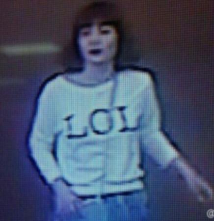 CCTV footage of the woman assassin wearing the white 'LOL' tshirt Ki assasin CCTV
