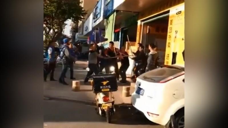 Representational image Deliverymen from rival food delivery apps brawl in China