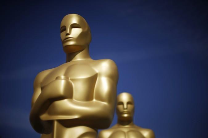 Oscar statues stand in a parking lot near the Dolby Theater during preparations ahead of the 87th Academy Awards in Hollywood. Oscars