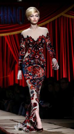 Model Gigi Hadid presents a creation from Moschino's Autumn/Winter 2017 women's collection during Milan Fashion Week in Milan, Italy, February 23, 2017. Gigi Hadid