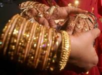 indian marriages, indian grooms and brides, marriages in india, axis bank merger, axis bank shikha sharma, axis bank share price, kotak mahindra bank