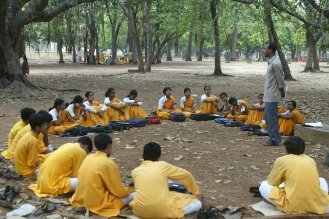 Students study in the open in Santiniketan. Santiniketan students studying in the open
