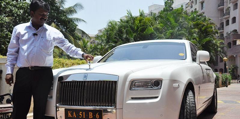 Ramesh Babu with his Rolls-Royce Ghost. Billionaire barber Ramesh Babu