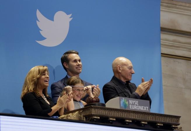 Actor Patrick Stewart (R) and 9-year-old Vivenne Harr (C), who uses proceeds from her lemonade stand to fight slavery, ring the opening bell as NYSE Executive Vice President and Head of Global Listings Scott Cutlerand and Boston police officer Cheryl Fiandaca (L) look on during the Twitter Inc. IPO on the floor of the New York Stock Exchange in New York, November 7, 2013. twitter ipo, twitter share price, twitter listing, snap listing, snapchat, facebook ipo, alibaba ipo