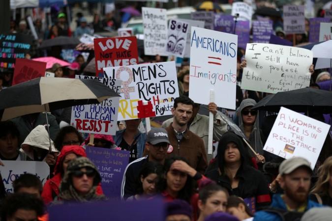 People attend a rally for International Women's Day in Los Angeles, California, U.S., March 5, 2017. International Women's Day