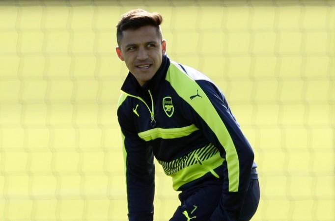 Alexis Sanchez is all smiles during an Arsenal training session on Monday, March 6, 2017 Alexis Sanchez, Arsenal, Arsene Wenger, Bayern Munich, Champions League