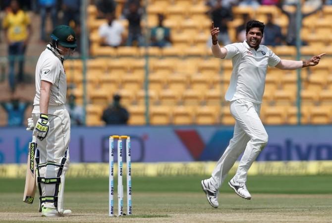 Steven Smith looks down in despair after being given out lbw off the bowling of Umesh Yadav on day four afternoon, March 7, 2017 Steven Smith, Australia, Umesh Yadav, India, 2nd Test