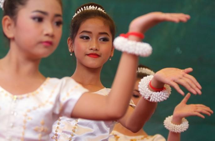Dancers perform to commemorate the upcoming Women's Day in Phnom Penh