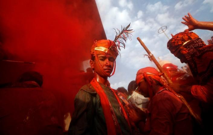 Hindu devotees take part in the religious festival of Holi in Nandgaon village, in the state of Uttar Pradesh, India. Holi 2017