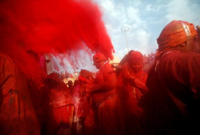 Hindu devotees take part in the religious festival of Holi in Nandgaon village, in the state of Uttar Pradesh, India. Holi 2017