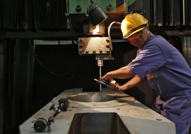 An employee works on the production line inside the heavy electrical manufacturing unit of Larsen & Turbo in Mumbai December 4, 2013 (representational image). india trade, L&T, larsen and toubro, india engg exports, india external trade, india exports, india imports, nirmala sitharaman, IESS Chennai