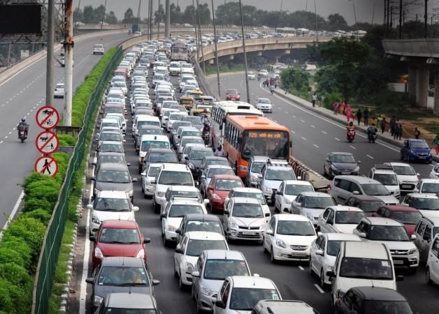 Heavy traffic moving on NH-8 near Dhaula Kuan in New Delhi on August 17, 2016. cars, car sales, domestic car sales, gst on cars, auto industry, traffic