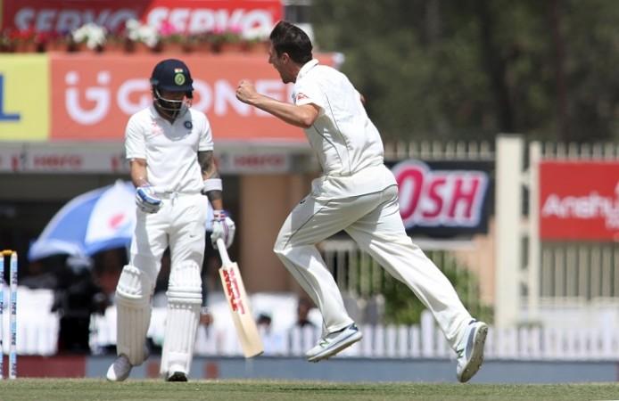 Pat Cummins goes on a celebratory run after dismissing Virat Kohli, March 18, 2017 Pat Cummins, Australia, Virat Kohli, India, Day 3