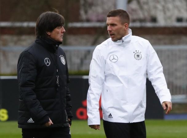 Joachim Low with Lukas Podolski lukas podolski