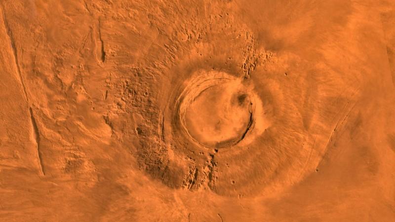 This digital-image mosaic of Mars' Tharsis plateau shows the extinct volcano Arsia Mons. It was assembled from images that the Viking 1 Orbiter took during its 1976-1980 working life at Mars. nasa, Mars, volcano, Mars exploration, Arsia Mons