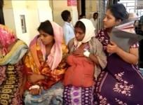 Four women on a stretcher in Karnataka