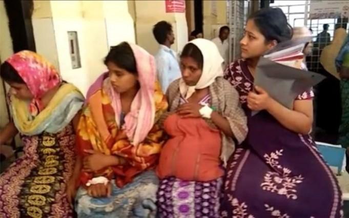 In picture: Four pregnant women being carried on a single stretcher at <span>KIMS</span>, <span>Hubbali</span>. Four women on a stretcher in Karnataka