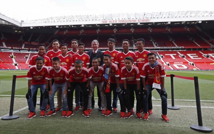 Bryan Robson with Manchester United fans at Old Trafford manchester united