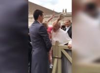 Little girl sneakily steals Popes hat while going in for a kiss