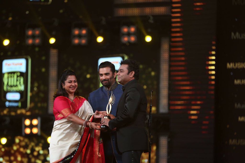 Radikaa Sarathkumar presenting an Award to AR Rahman