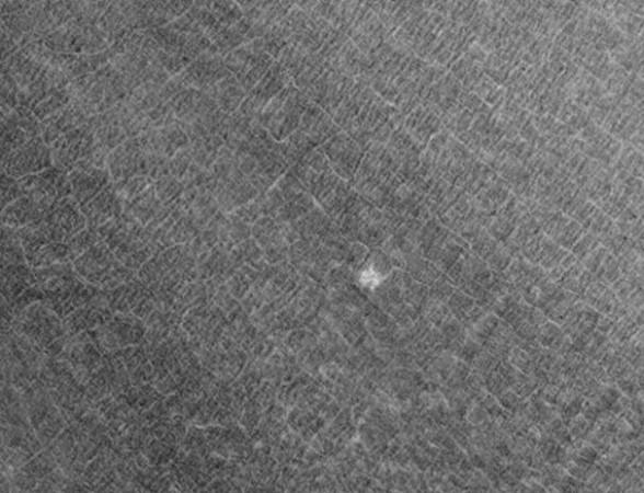 A small portion of the interior of Lomonosov Crater showing patterned ground, as seen by MGS. Location is 64.5 degrees north latitude and 352.6 degrees east longitude. This image was taken with the Mars Orbital Camera MOC) on the Mars Global Surveyor (MGS). Mars, space, nasa, water, asteroid,