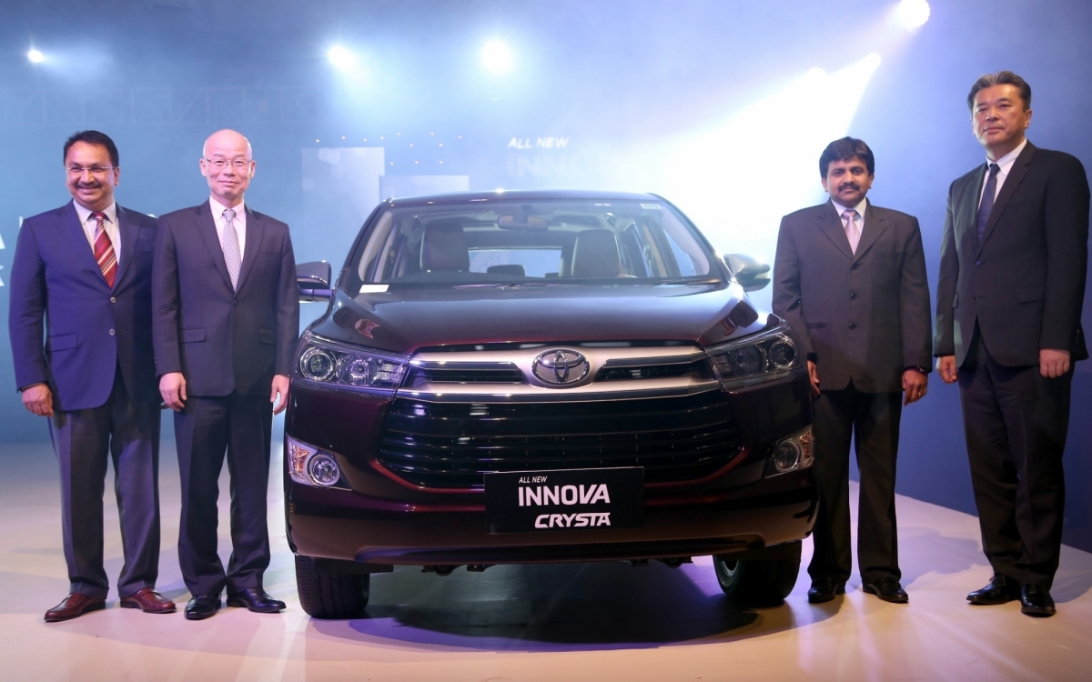 Toyota Kirloskar Motor Vice Chairman Vikram S Kirloskar, Managing Director Akito Tachibana, Director and Senior Vice President N Raja during the launch of Innova Crysta in Bengaluru on May 13, 2016. toyota kirloskar motor, tkm, Innova Crysta, fortuner, etios, tkm cars, domestic car sales, car sales