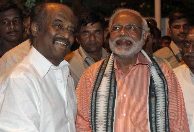 Narendra Modi met Rajinikanth during his election campaign in 2014. Narendra Modi with Rajinikanth