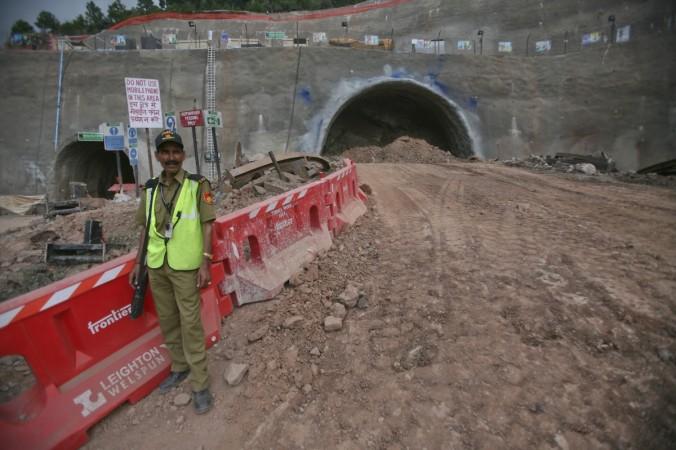 A security personnel stands guard at Chenani-Nashri tunnel project, India's longest road tunnel at Chenani village, about 90 km (56 miles) north of Jammu September 2, 2011. chenani nashri tunnel, inauguration prime minister modi