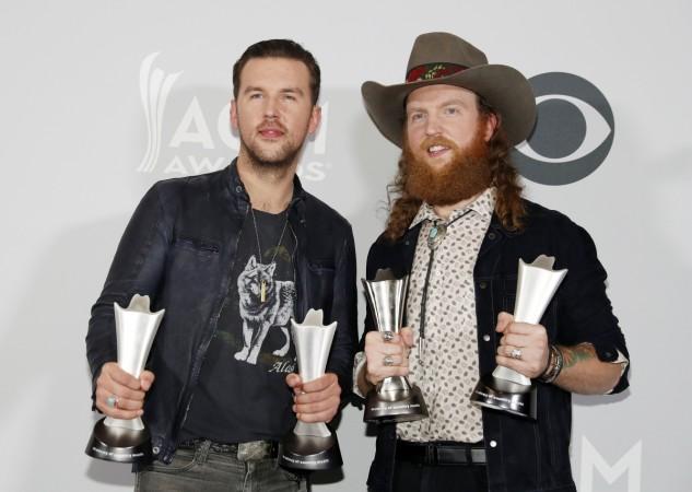 Brothers Osborne pose with their awards for Vocal Duo of the Year and New Vocal Duo/Group. Academy of Country Music Awards