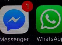 WhatsApp and Facebook messenger icons seen on iPhone