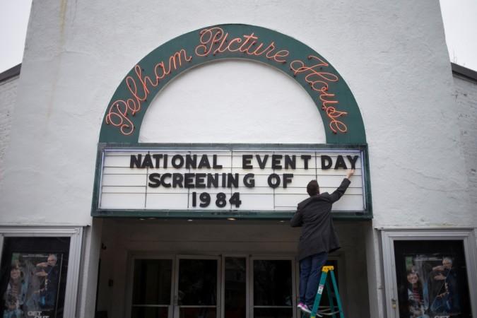 An employee at The Picture House Regional Film Center, places letters on a sign board ahead of the screening for the movie 1984 in Pelham, New York. 1984 movie