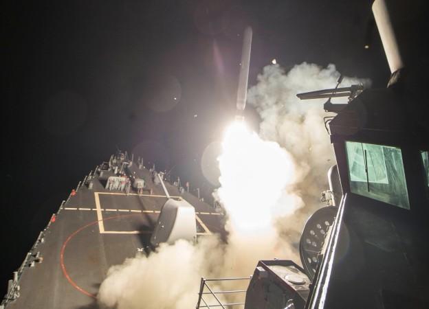 U.S. Navy guided-missile destroyer USS Ross (DDG 71) fires a tomahawk land attack missile in Mediterranean Sea on April 7, 2017. Tomahawk missile