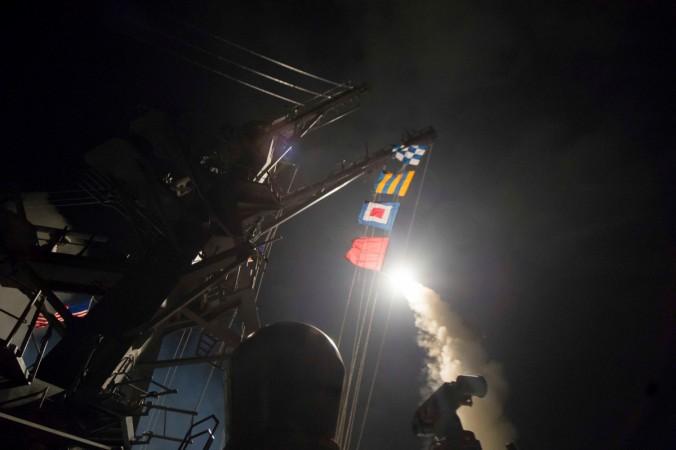 U.S. Navy guided-missile destroyer USS Ross (DDG 71) fires a tomahawk land attack missile US airstrikes