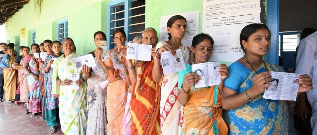 In picture: Women queue up to cast their votes during by-elections to Nanjungud Assembly constituencies, in Mysuru on April 9, 2017. Election