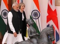 Theresa May and Narendra Modi