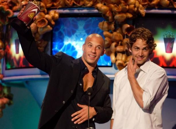 Actors Vin Diesel (L) and Paul Walker accept their award for Best On Screen Team for their roles in the film Actors Vin Diesel (L) and Paul Walker accept their award for Best On Screen Team