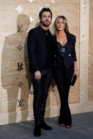 Jennifer Aniston in Louis Vuitton attends a Louis Vuitton dinner