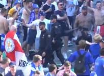 Shocking footage of heavy handed riot police and Leicester City fans in Madrid