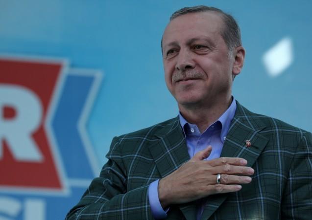Turkish President Tayyip Erdogan addresses his supporters during a rally for the upcoming referendum in Istanbul Erdogan
