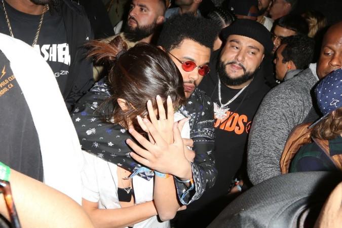 Selena Gomez avoids the cameras at the Coachella music festival Selena Gomez and The Weeknd