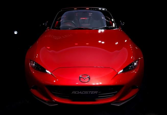 Mazda Motor Corp's new open-top sports car mazda sports cars, porsche sports cars, mazda ceo Masahiro Moro, porsche ceo Klaus Zellmer
