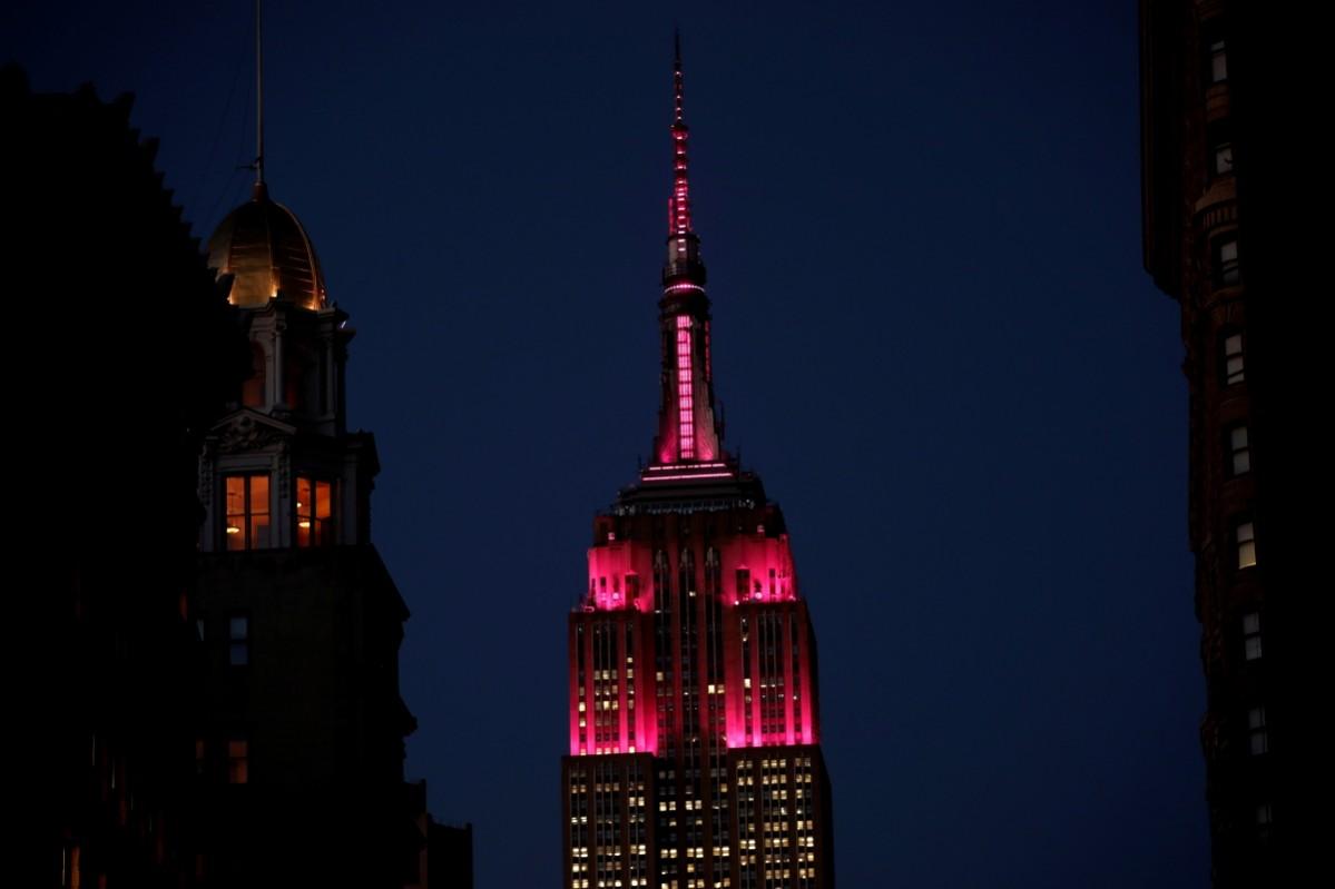 The Empire State Building is seen lit in pink for International Women's Day Empire State Building