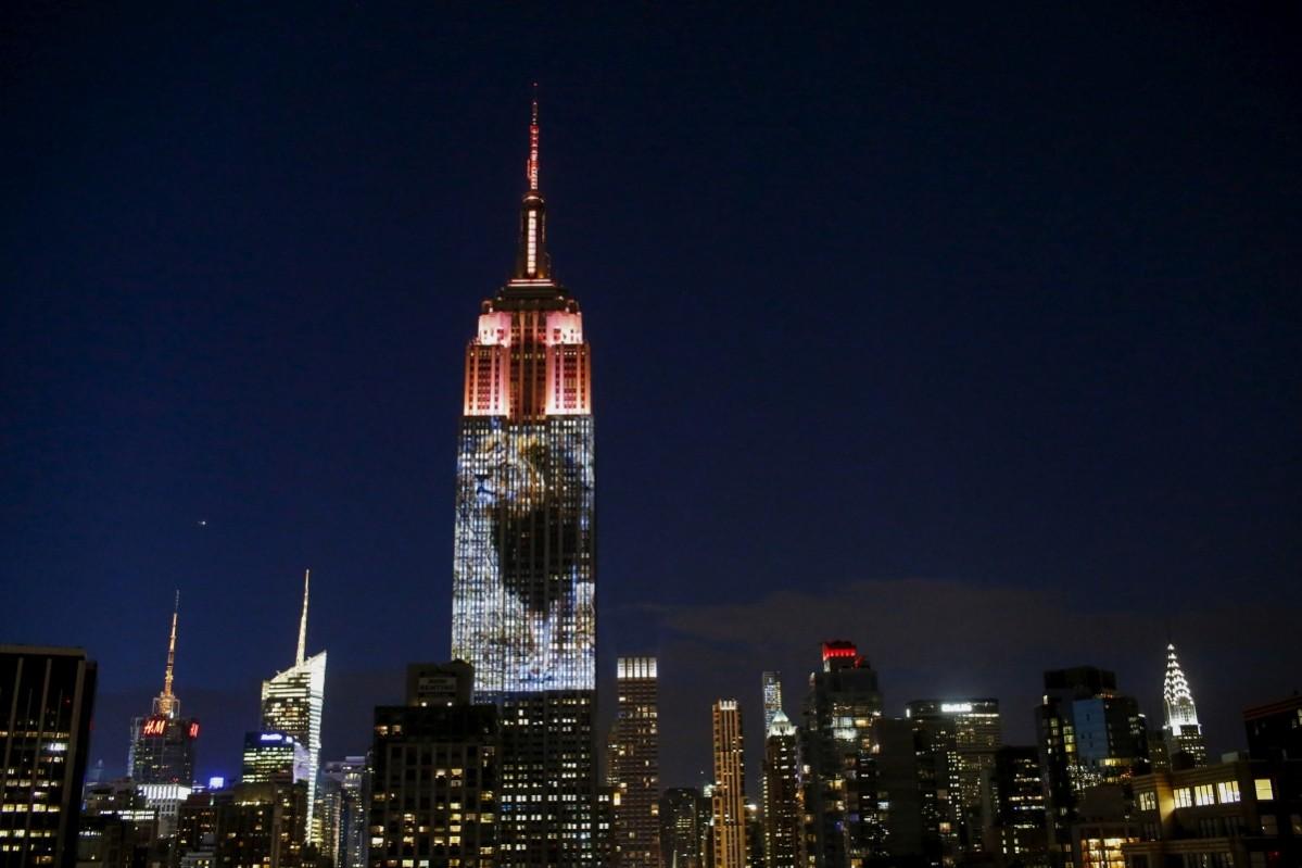 An image of Cecil the lion is projected onto the Empire State Building as part of an endangered species projection to raise awareness. Empire State Building