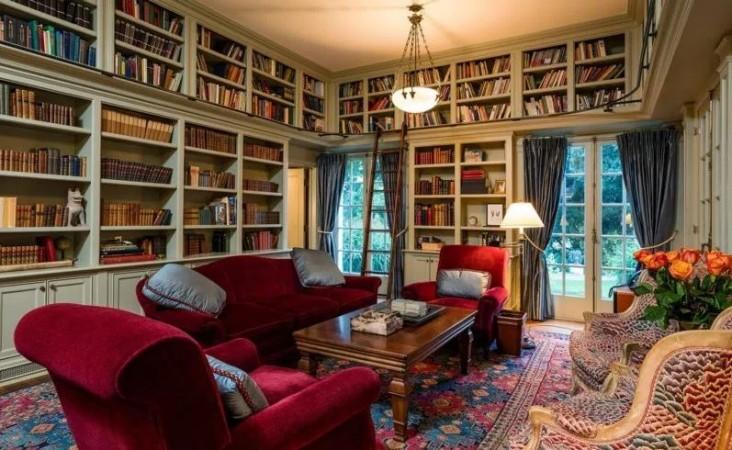 The library with floor to ceiling shelves Angelina Jolie home