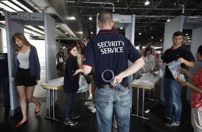 Security guards check the bags of applicants for the study of medicine at Vienna University. Metal detectors in schools