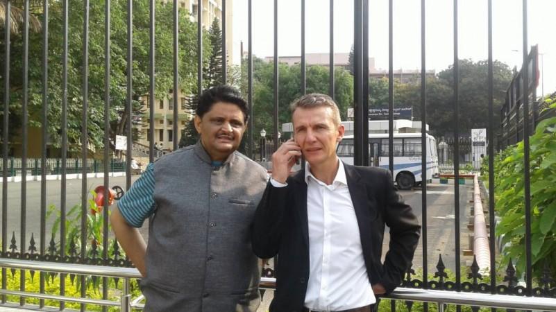 Kumar Jahgirdar (Left) after the court verdict in Bengaluru. Pascal Mazurier and Kumar Jahgirdar
